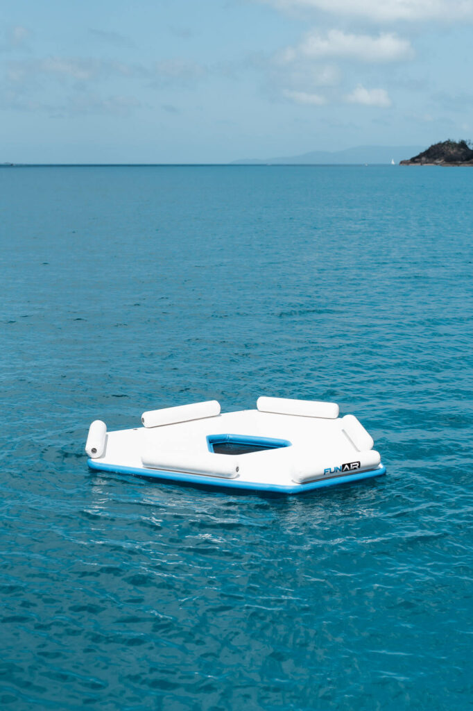 Guests relaxing on the FUNAIR Splash Island beside M/Y ALANI