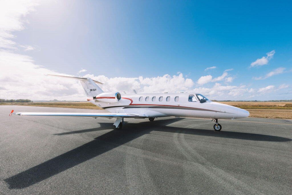 Private jet parked on the tarmac